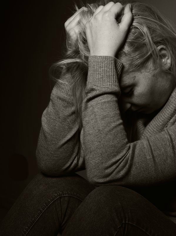 Sad Woman Overwhelmed With Despair