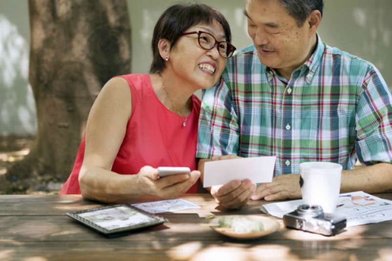 Older Couple Enjoying Family Memories