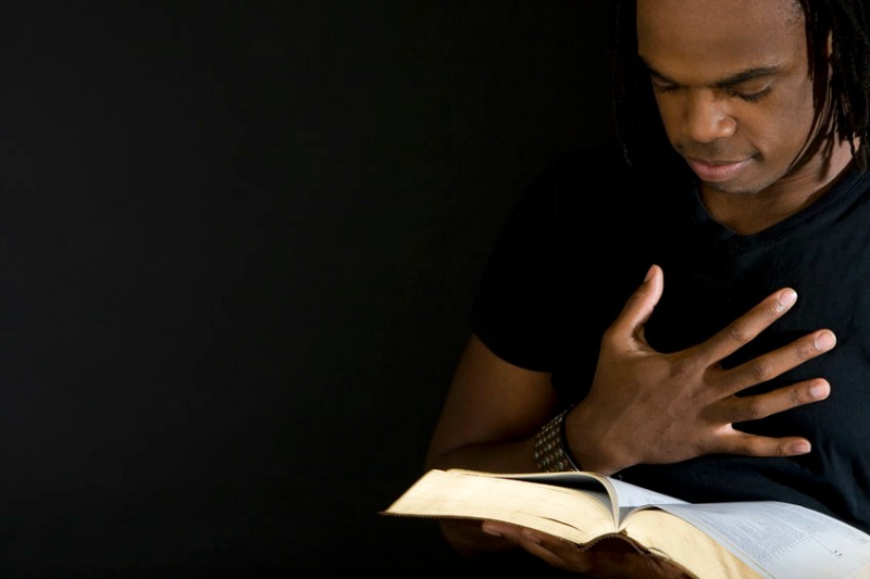 Man reading God's Word is encouraged in his heart